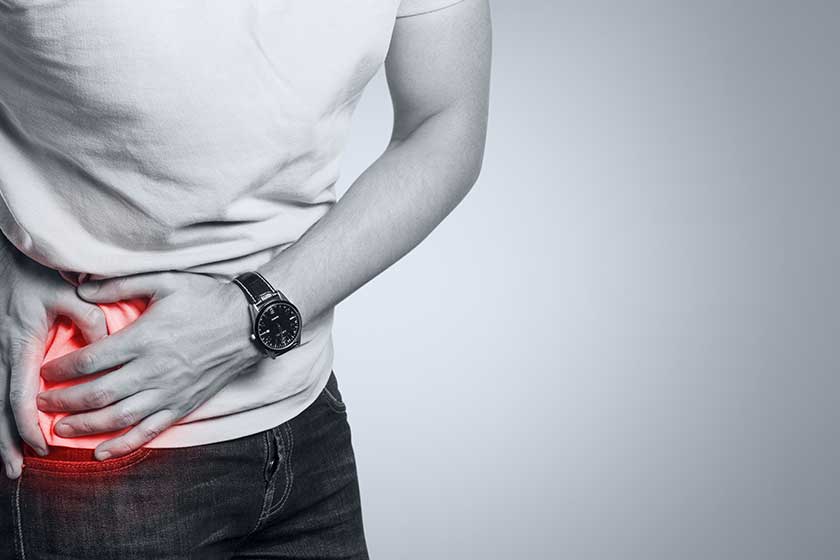 Man suffering from abdominal pain