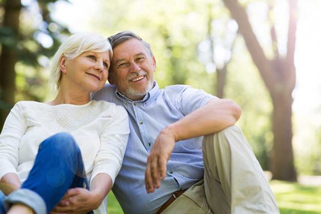 Senior couple embracing outdoors