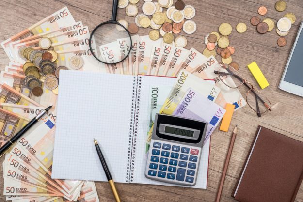 Smart phone, pen, euro money with notepad, pen, calculator  at o How Much Do Retirement Homes Cost In Jackson, NJ?