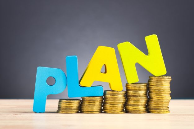 financial planning concept,word PLAN and stacking coins on woode Independent Living In Magnolia, NJ: Financial Planning Tips