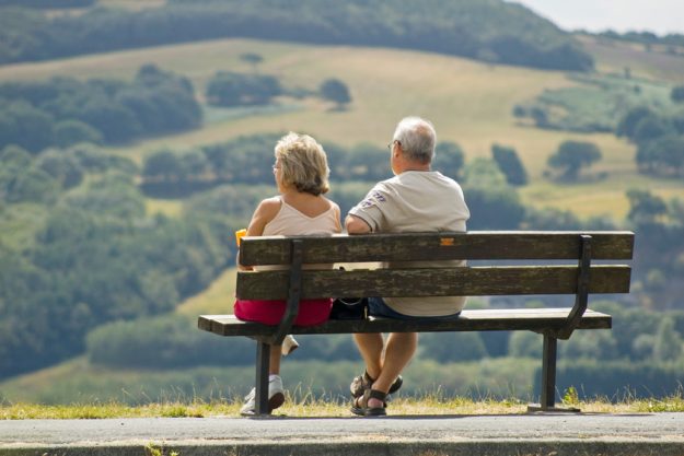 Two older people on a bench Are you retired And Bored? Here Are Things You Can Do