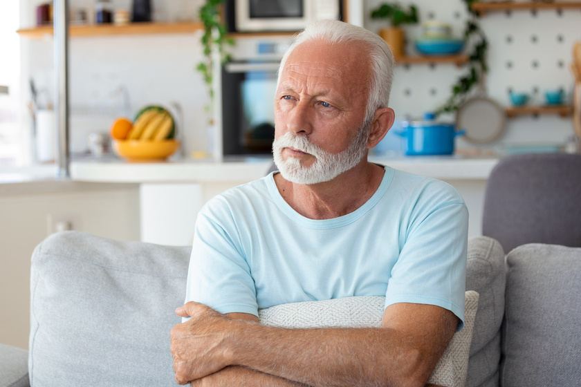 Thoughtful senior man relaxing at home. Close up of a senior man contemplating Three Top Challenges Of Retirement