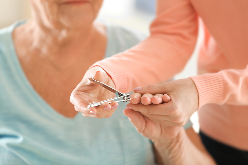 Woman manicuring hands of elderly patient, closeup How Assisted Living Homes In Cavetown, MD, Handle Seniors' Poor Hygiene
