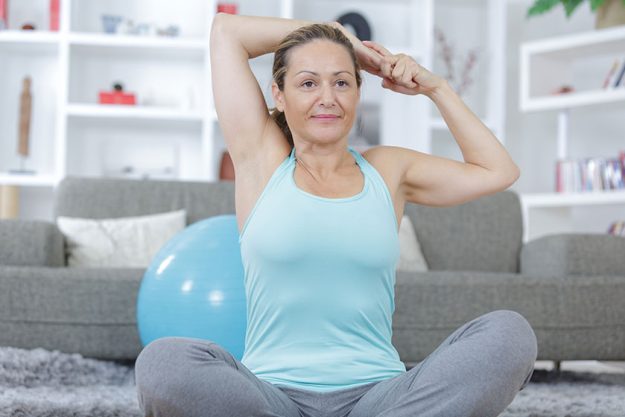 Middle aged or mature woman doing yoga Middle aged or mature woman doing yoga