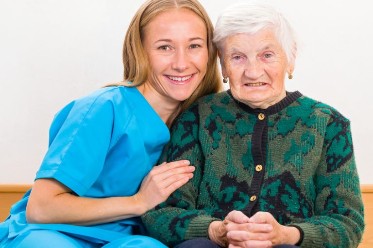 Elderly woman and young doctor