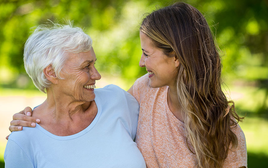 Family standing and smiling Family standing and smiling