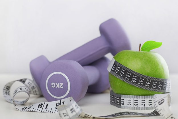 Dumbbells tape measure apple
