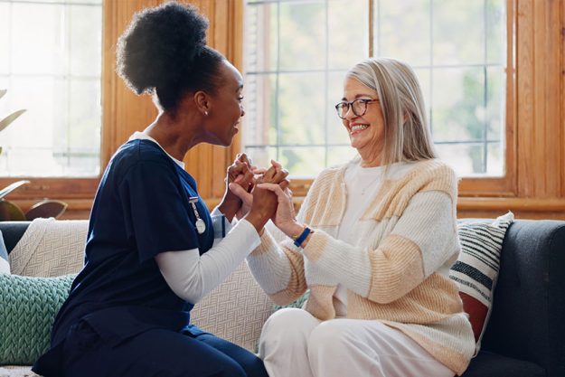 Funny happy caregiver talking healthcare