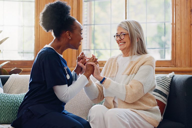 Funny happy caregiver talking healthcare