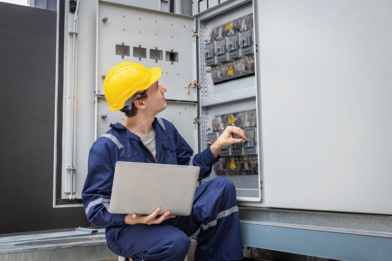 Electrical engineer working control room electrical engineer man checking power