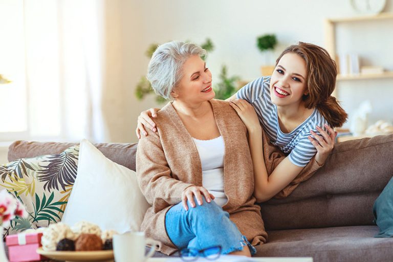 Happy family two generations old mother and adult daughter