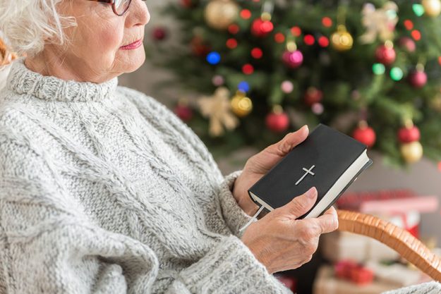 Calm old woman is resting at home in holiday