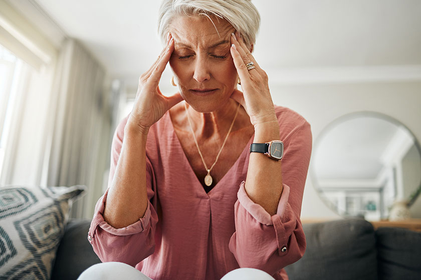Headache pain, anxiety and senior woman thinking mental health problem