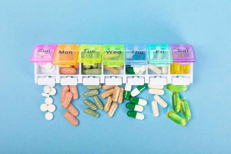 Vitamins and supplements. Variety of vitamin tablets