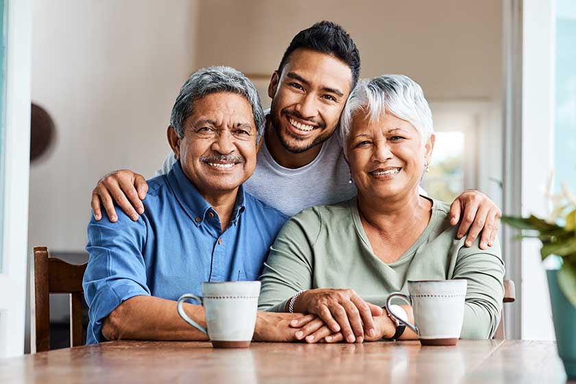 Shot of a young son spending time with his parents at home.