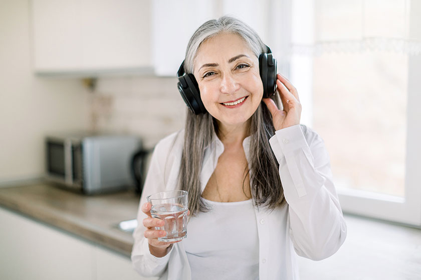 Portrait-of-happy-smiling-mature-granny-with-long-gray-hair