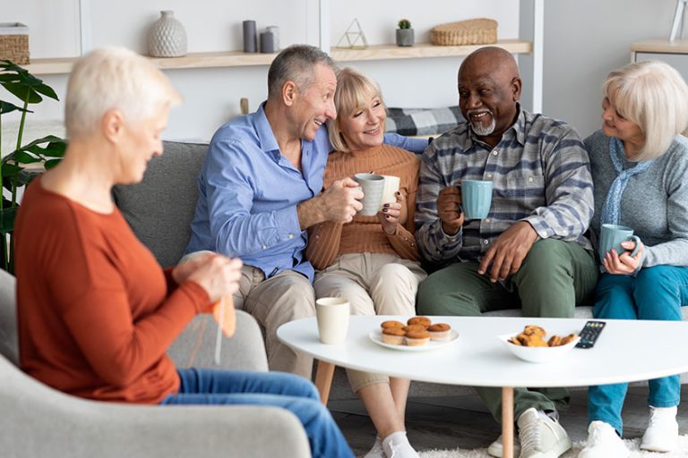 Positive-multiracial-senior-people-spending-time-together