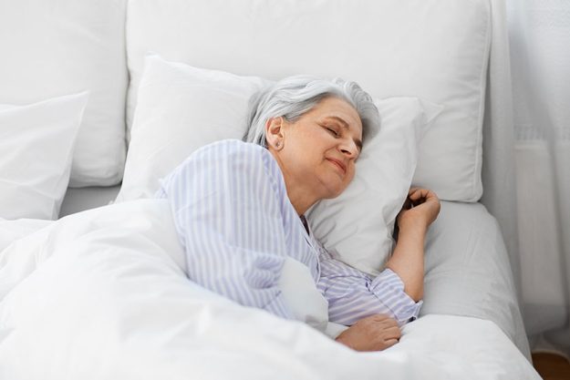 Senior-woman-sleeping-in-bed-at-home-bedroom Senior-woman-sleeping-in-bed-at-home-bedroom