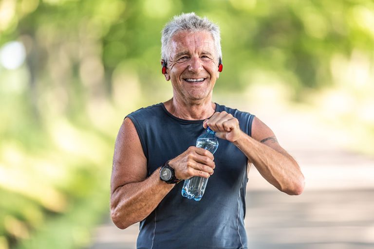 Smiling-fit-and-retired-man-with-grey-hair-smiles