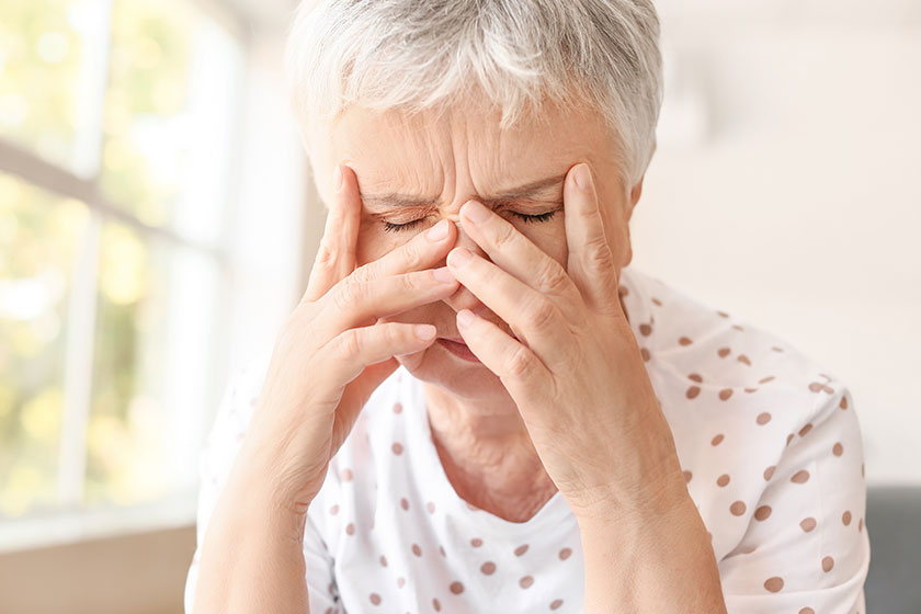 Stressed-senior-woman-suffering-from-headache Stressed-senior-woman-suffering-from-headache