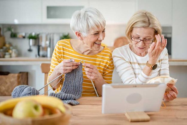 Two-women-senior-mature-caucasian-friends-or-mother