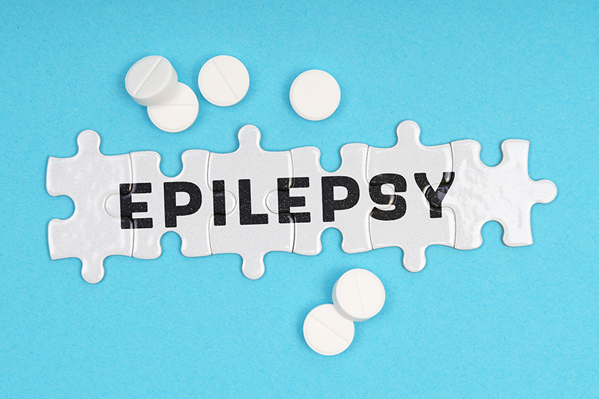 medicine-concept-blue-background-pills-puzzles-inscription-epilepsy medicine-concept-blue-background-pills-puzzles-inscription-epilepsy