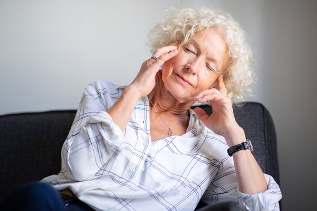 portrait-elderly-woman-sitting-sofa-headache-hands-head portrait-elderly-woman-sitting-sofa-headache-hands-head