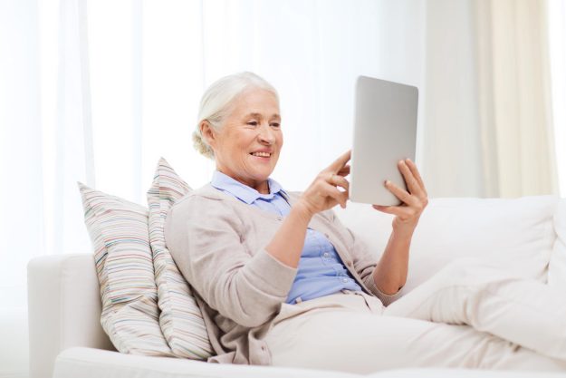 Technology,,Age,And,People,Concept,-,Happy,Senior,Woman,With