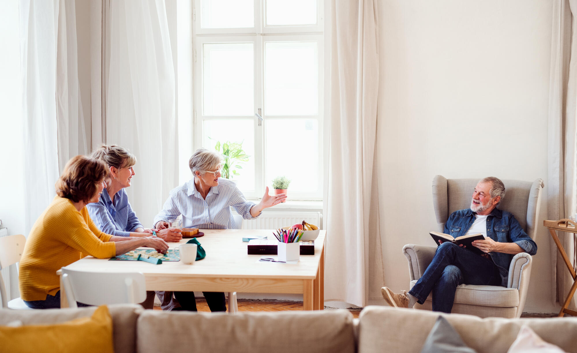 Group,Of,Senior,People,Playing,Board,Games,In,Community,Center
