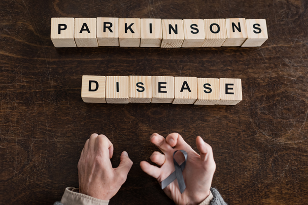 Top view of cropped man holding grey ribbon