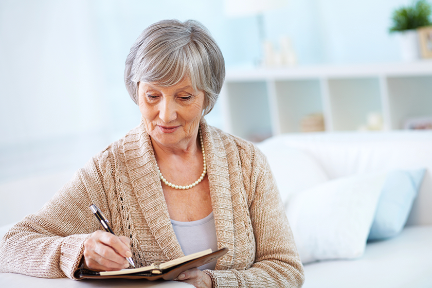 senior-woman-making-notes Senior woman making notes